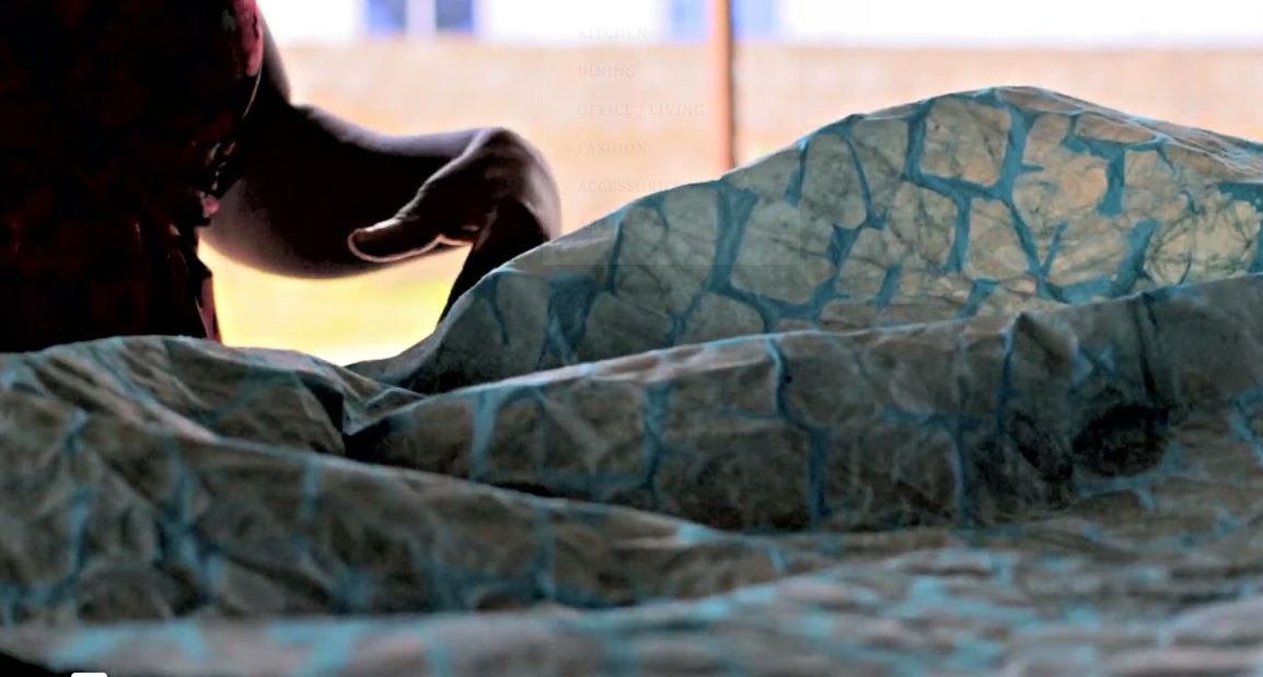Load video: Video showing Edtex Ghana employees designing fabric from scratch